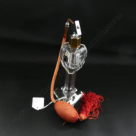 A vintage crystal perfume atomiser